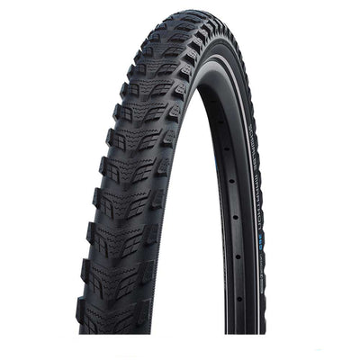 Black tire with tread pattern on a white background