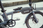 UTO Protective Travel Bag covering a folded bike