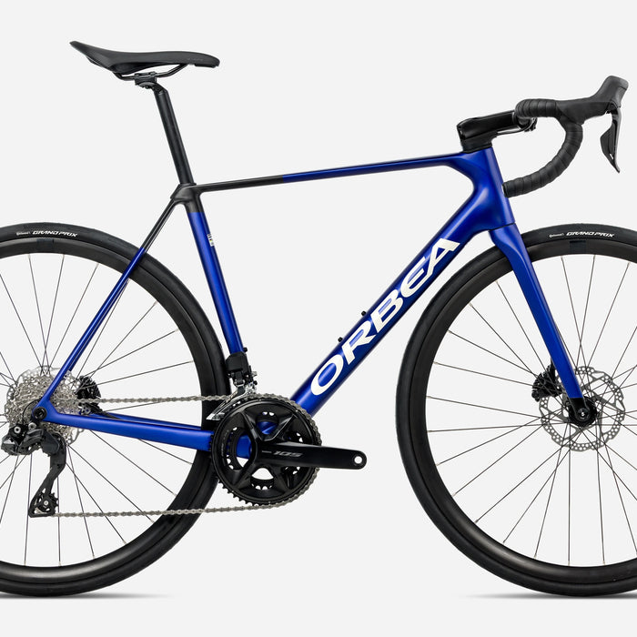 Orbea ORCA M30i Road Bike in Cobalt Blue - Carbon Raw (Matt), side view