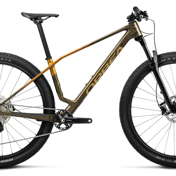 Orbea ALMA M50 Mountain Bike in Caramel Carbon View - Leo Orange (Gloss), side view