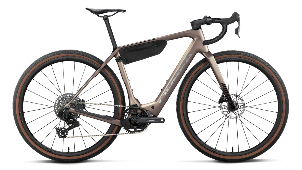 Orbea DENNA M31e Road Bike in Nickel Matt - Carbon Raw Gloss, side view