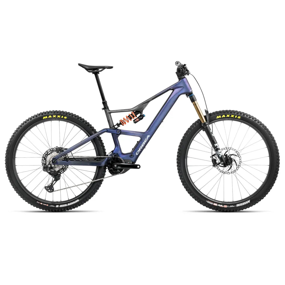 2025 Orbea Rise Lt M-Team 420W Carbon Electric Mountain Bike In Tanzanite Carbon View And Carbon Raw